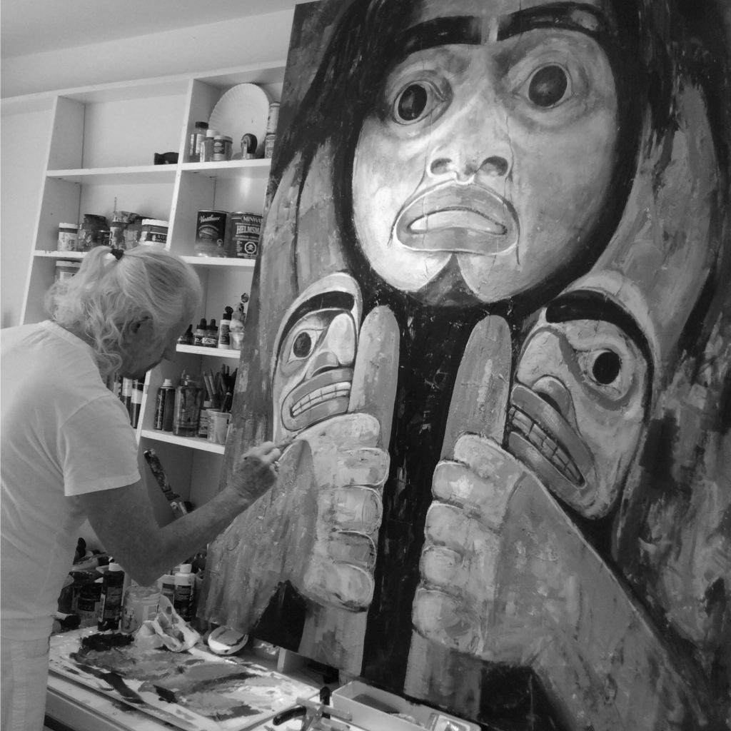 West Coast native art Paul Ygartua painting in his studio a native west coast painting.